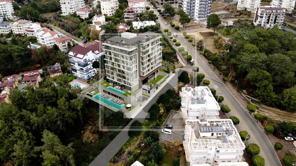 Чудовий садовий дуплекс 2+1 в елітному будинку в Авсалларі