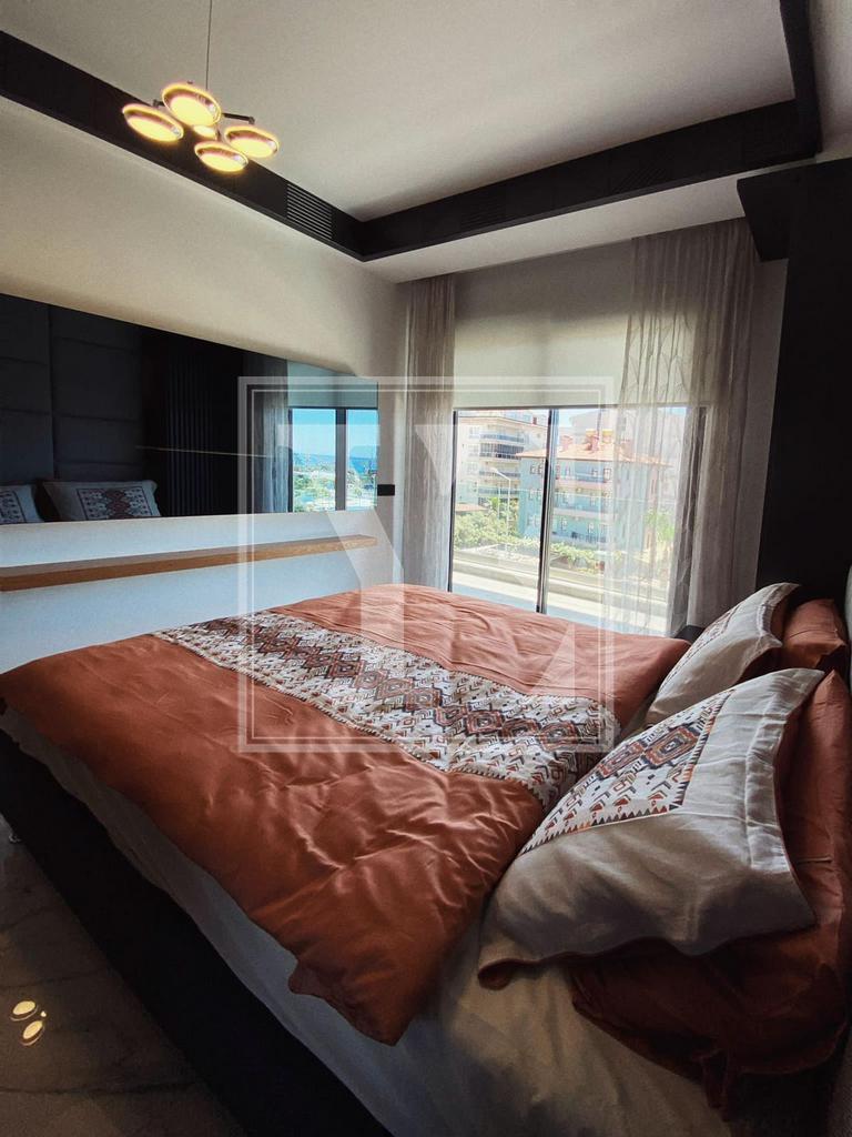 Елегантний садовий дуплекс 2+1 з прекрасним видом на Середземне море